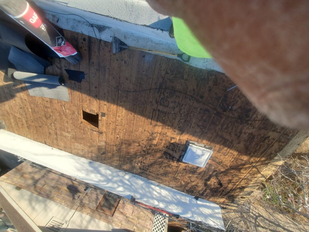 Slide of El Paso Roofing 915