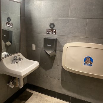 Starbucks - Sink area with baby changing table. Female restroom - Coffee & Tea Near Me - Orlando, Florida