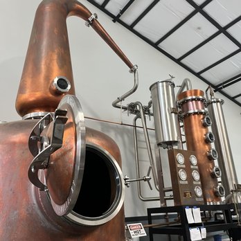 Highside Distilling - a row of distilling vessels - Distilleries Near Me - Bainbridge Island, Washington