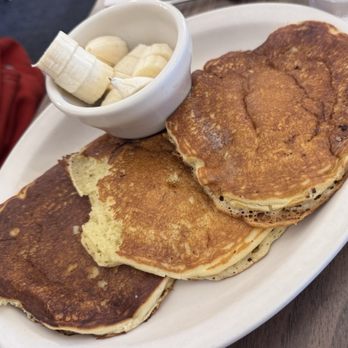 The Old European Restaurant - Three Buttermilk Hot Cakes w/ a side of sliced bananas - Breakfast & Brunch Near Me - Pullman, Washington