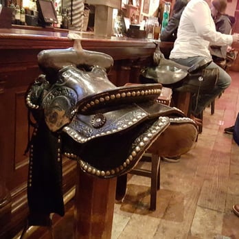 H3 Ranch - Saddle seats by the bar... very cute! - Steakhouses Near Me - Fort Worth, Texas H3 Ranch - Saddle seats by the bar... very cute! - Steakhouses Near Me - Fort Worth, Texas