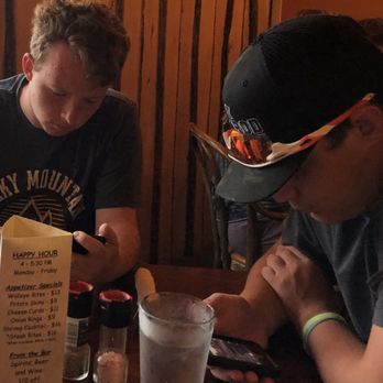 Y Steak House - two men sitting at a table - Steakhouses Near Me - Park Rapids, Minnesota Y Steak House - two men sitting at a table - Steakhouses Near Me - Park Rapids, Minnesota