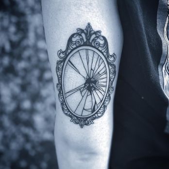Apollo Tattoo Studios - Illustrative stipple style tattoo of a breaking mirror. - Tattoo Near Me - Kissimmee, Florida Apollo Tattoo Studios - Illustrative stipple style tattoo of a breaking mirror. - Tattoo Near Me - Kissimmee, Florida