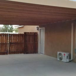 Completed carport with a door installed, looks fantastic!