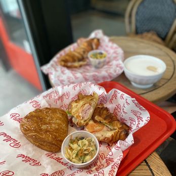 Paillard - a tray of food on a table - Bakeries Near Me - Quebec City, Quebec
