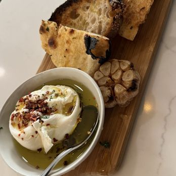 Pizzeria Irene - Burrata plate. The garlic was amazing and added so much to the cheese. Favorite! - Pizza Near Me - Orange, California Pizzeria Irene - Burrata plate. The garlic was amazing and added so much to the cheese. Favorite! - Pizza Near Me - Orange, California