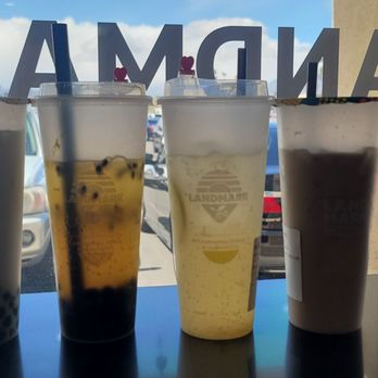 Landmark Tea - From left to right, there's a jasmine milk tea with boba, passion sparkling with boba, honey yuzu sparkling, and landmark oolong. - Tea Rooms Near Me - Las Vegas, Nevada Landmark Tea - From left to right, there's a jasmine milk tea with boba, passion sparkling with boba, honey yuzu sparkling, and landmark oolong. - Tea Rooms Near Me - Las Vegas, Nevada