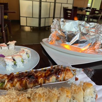 Izumi Japanese Restaurant - The FLAMING salmon roll was SO COOL! Literally on fire! - Sushi Bars Near Me - Eugene, Oregon