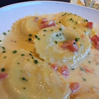 Carrabba's Italian Grill - Lobster Ravioli. Pasta had flavor and chew. Clean robust tasting lobster. Very Buttery. Tomatoes adds bright notes. Great execution! - Italian Near Me - Metairie, Louisiana
