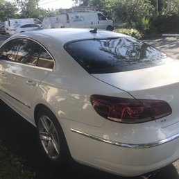 Roof and window damage from car wash.