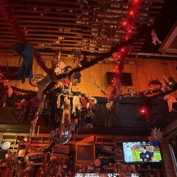 Tons of beer can used as their ceiling decor