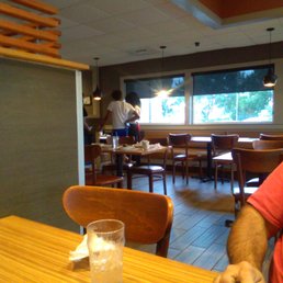 This is the girl flirting and not taking care of customers. This is the girl flirting and not taking care of customers.