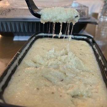 Federal American Grill - Cheese grits...look at that cheese pull. - Burgers Near Me - Houston, Texas Federal American Grill - Cheese grits...look at that cheese pull. - Burgers Near Me - Houston, Texas
