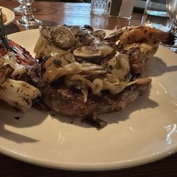 Chillinghams Steak - Ribeye with giant shrimp, mushrooms, and onions.