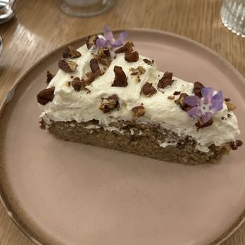 Saffy's - banana cake with soft cheese frosting, baharat spiced pecan - Middle Eastern Near Me - Los Angeles, California