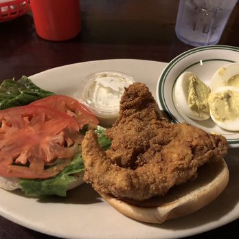 The Beach Pit - Fried grouper sandwich with delicious deviled eggs for my side. - Barbeque Near Me - St. George Island, Florida The Beach Pit - Fried grouper sandwich with delicious deviled eggs for my side. - Barbeque Near Me - St. George Island, Florida
