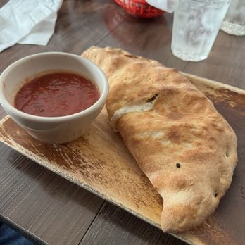Fratelli's Pizza - Meat Lover Calzone - Pizza Near Me - North Hills, California Fratelli's Pizza - Meat Lover Calzone - Pizza Near Me - North Hills, California