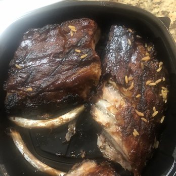 Texas Roadhouse - Partially eaten rack of ribs - Steakhouses Near Me - Katy, Texas