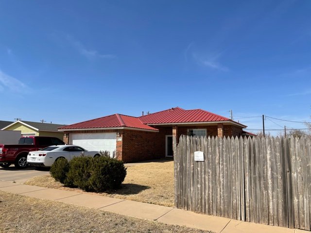 Slide of Roof Master & Construction