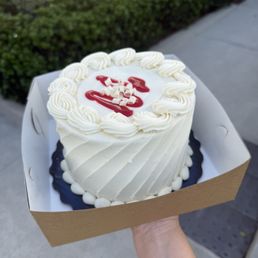They handed the cake to us without a box or cover -- just only the bare cake in an open tray. Price: $45