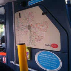 Reading Buses - Inside of one of the buses, with the map of Reading on the stairs to the upper level.