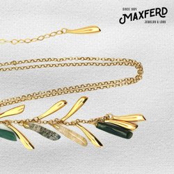 Maxferd Jewelry & Loan - Nature's Elegance in Gold Discover the beauty of our gold necklace adorned with stone charms.