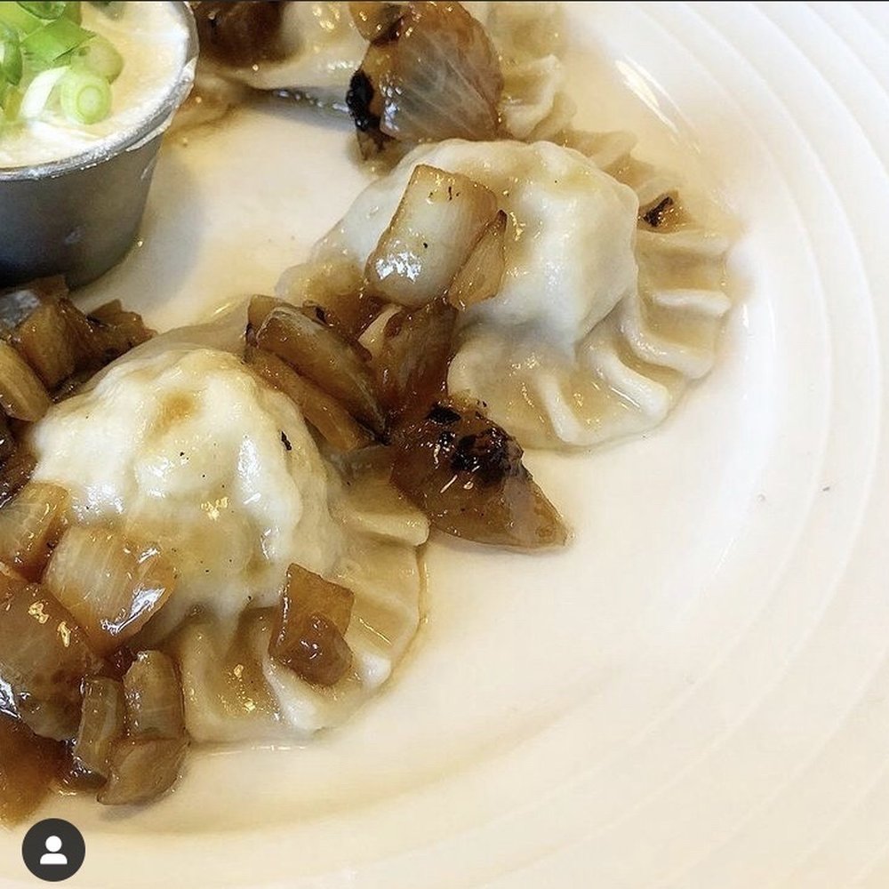 Kozak Ukrainian Eatery - Pork and onion perogies w sour cream. About seven or eight pcs - Ukrainian Near Me - Vancouver, British Columbia Kozak Ukrainian Eatery - Pork and onion perogies w sour cream. About seven or eight pcs - Ukrainian Near Me - Vancouver, British Columbia
