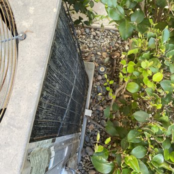 Starlight HVAC - This is where the unit is and what it looks like being 32 years old. - Heating & Air Conditioning/HVAC Near Me - Irvine, California