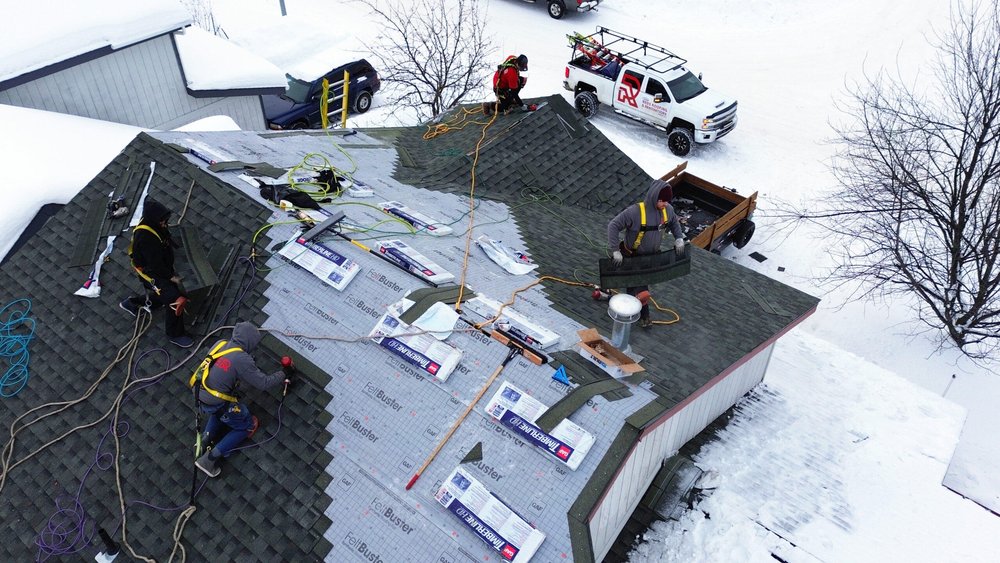 Slide of Reds Roofing & Renovations