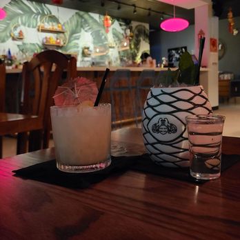 Paper Lantern - a drink and a drink glass on a table - Asian Fusion Near Me - Calgary, Alberta Paper Lantern - a drink and a drink glass on a table - Asian Fusion Near Me - Calgary, Alberta