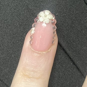 Natomas Nails - Uneven, and bubbles - Nail Salons Near Me - Sacramento, California