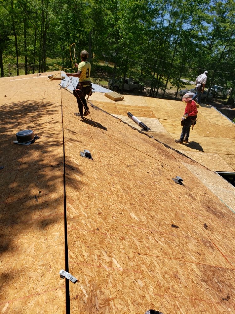 Slide of Ram's Roofing Service