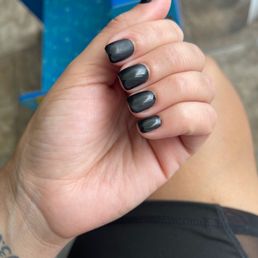 Disgusting "Gel" manicure. More like Garbage rushed work.