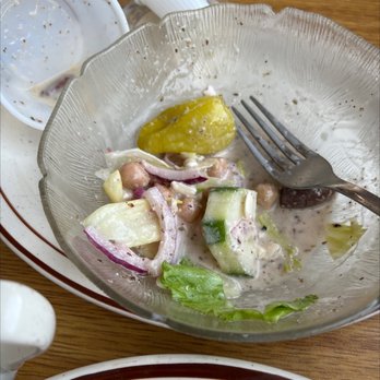 Howell Coney Island - What's left of my Greek salad, it was delicious with farm fresh tomatoes!!! - American Near Me - Howell, Michigan Howell Coney Island - What's left of my Greek salad, it was delicious with farm fresh tomatoes!!! - American Near Me - Howell, Michigan