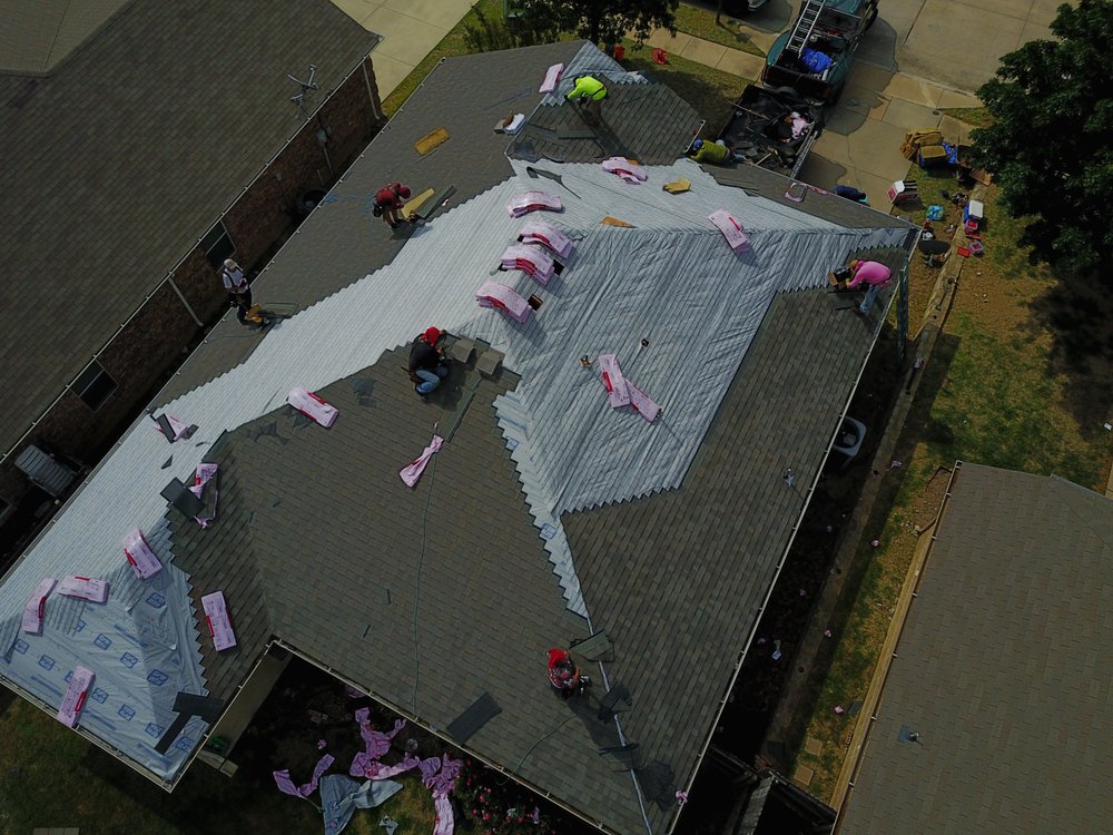 Slide of RMC Roofing and Construction