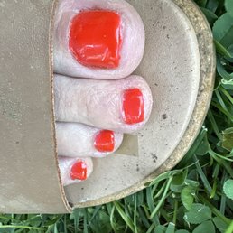 Gel Nail polish on skin. Polish uneven at cuticle. Gel Nail polish on skin. Polish uneven at cuticle.