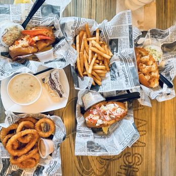 DJ's Clam Shack - 2 Maine lobster rolls (one hot, one cold) Lobster rolls come with cold slaw  Shrimp roll Clam chowder  Onion rings French fries - Seafood Near Me - St. Augustine, Florida