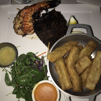 Zona De Cuba - Skirt steak with Lobster Tail & Yuca Fries - Cuban Near Me - Bronx, New York Zona De Cuba - Skirt steak with Lobster Tail & Yuca Fries - Cuban Near Me - Bronx, New York