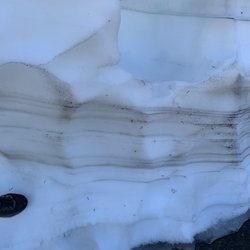 Mather Memorial Parkway - Snow with my shoe (black object in the lower left) for scale on the 26th of June 2020.