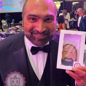 Yummyholic - The late Franco Harris with his portrait cookie. - Cupcakes Near Me