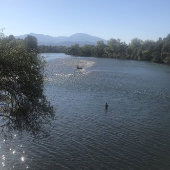 Sundial Bridge - Boaters and Fly Fishermen on the Sacramento River - Landmarks & Historical Buildings Near Me - Redding, California Sundial Bridge - Boaters and Fly Fishermen on the Sacramento River - Landmarks & Historical Buildings Near Me - Redding, California