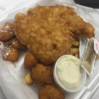 Clermont Fish House - Cod & Chips with a side of sweet corn nuggets and hush puppies from Clermont Fish House! - Fish & Chips Near Me - Clermont, Florida Clermont Fish House - Cod & Chips with a side of sweet corn nuggets and hush puppies from Clermont Fish House! - Fish & Chips Near Me - Clermont, Florida