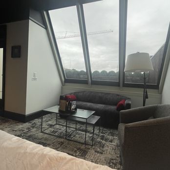 Bottleworks Hotel - Sitting Area with View of the Terrace (door to the private terrace is to the left.) - Hotels Near Me - Indianapolis, Indiana