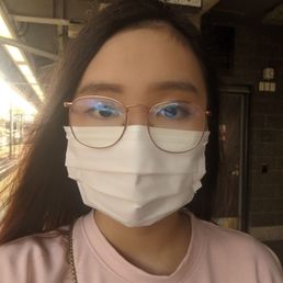 My hair before cutting. I had long, lower-back-length hair with no bangs