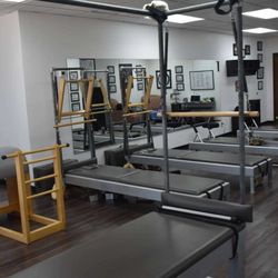 Fit N Pilates - Fully equipped Pilates Studio! Cadillac, reformers, barrels, towers and chairs.