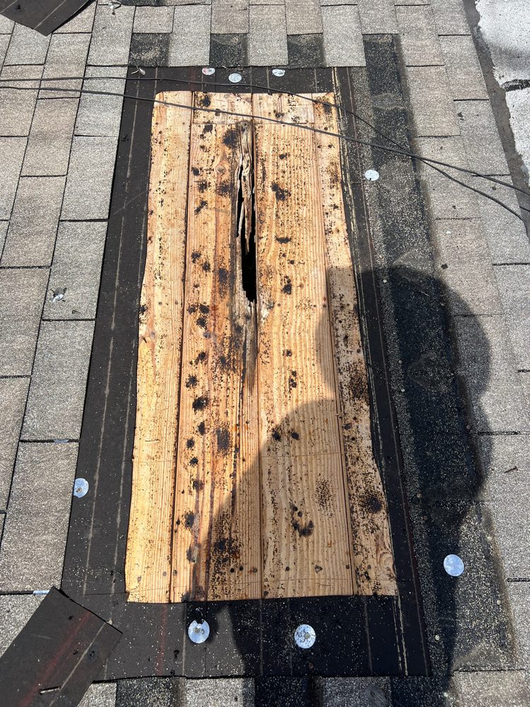 Slide of Combat Roofing Services