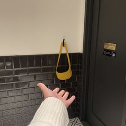 T-Squared Social - Good for preventing accidental splashes, bad if you need something after hanging up your bag.