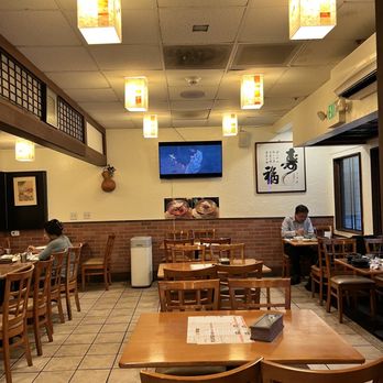 MG Tofu House - a restaurant with tables and chairs - Korean Near Me - Los Angeles, California MG Tofu House - a restaurant with tables and chairs - Korean Near Me - Los Angeles, California