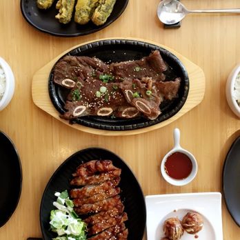Négasaké - Tako Yaki (wheat ball with octopus), Galbi (Grilled short ribs), Fried chicken and Kim Mari (Korean deep fried seaweed rolls) - Korean Near Me - Montreal, Quebec Négasaké - Tako Yaki (wheat ball with octopus), Galbi (Grilled short ribs), Fried chicken and Kim Mari (Korean deep fried seaweed rolls) - Korean Near Me - Montreal, Quebec