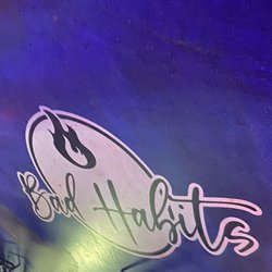 Bad Habits Bar & Grill - Sign on the floor